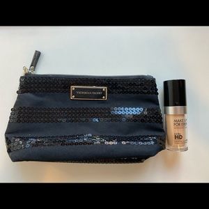 Make Up For Ever Foundation with a makeup bag